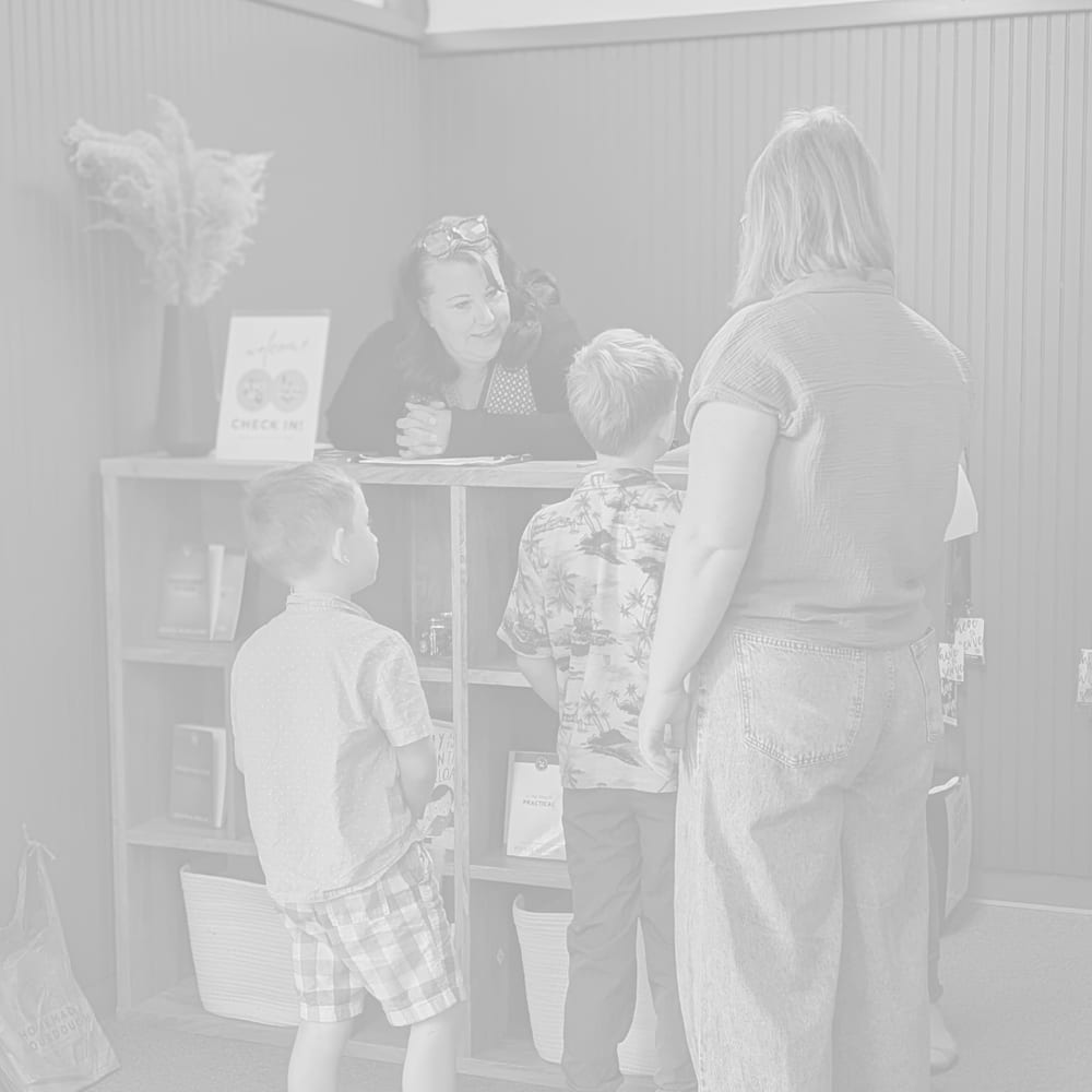 Families checking in at Olivet Kids